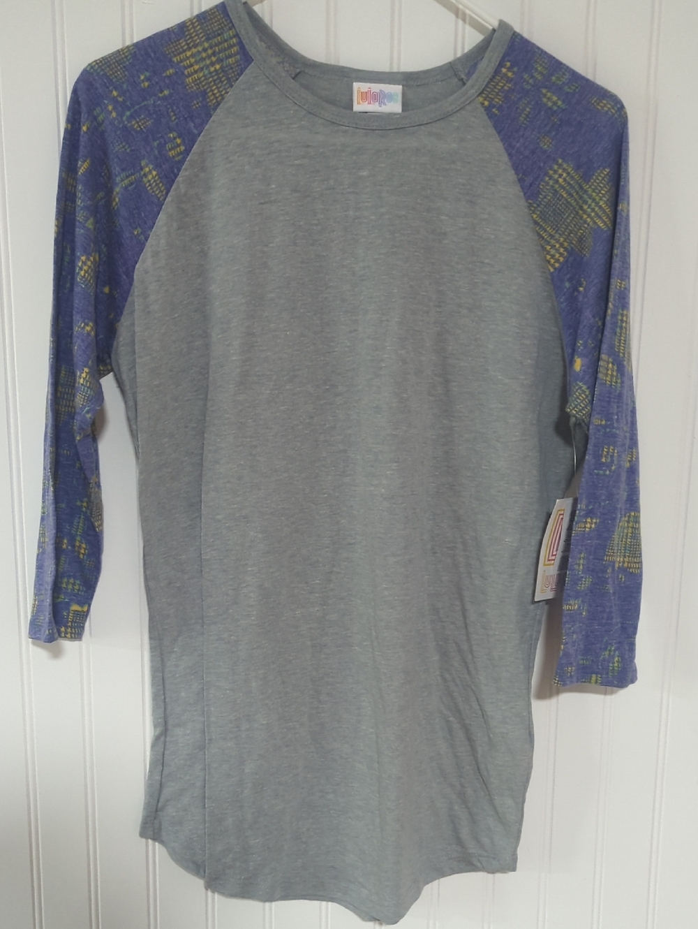 LuLaRoe Gray Raglan Top with Purple & Yellow Patterned Sleeves